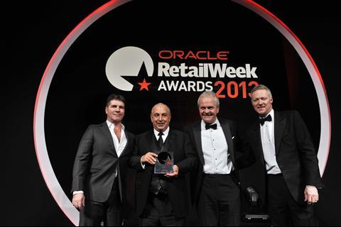 Sir Philip Green collects Outstanding Contribution to Retail award